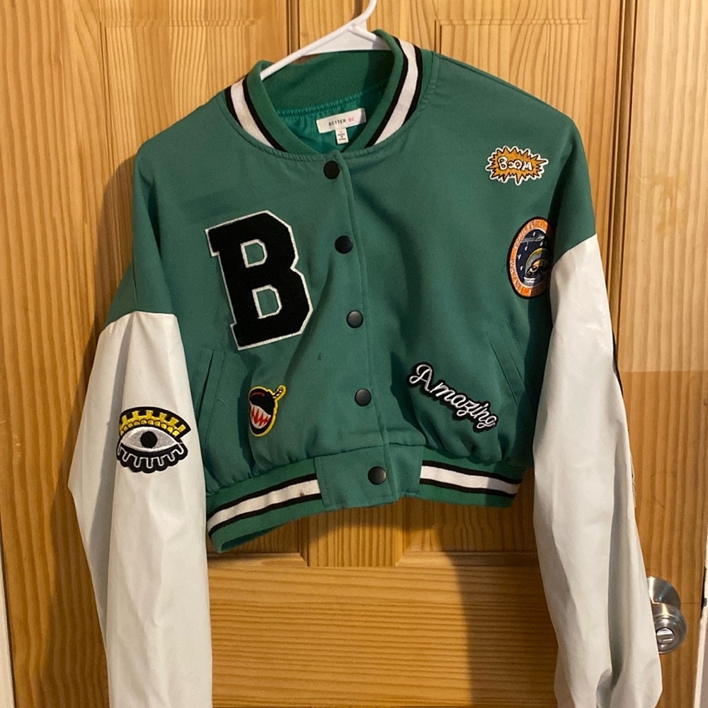 green and white patched cropped puffy jacket